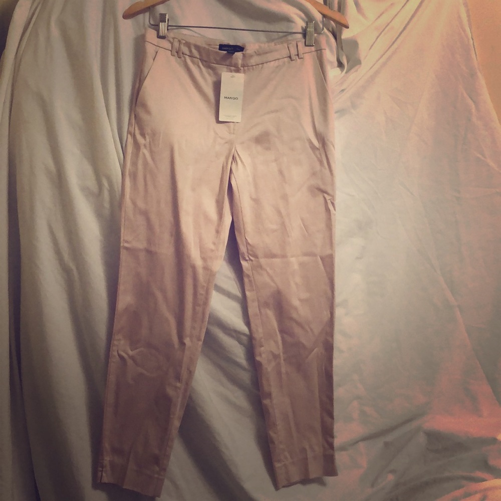 Light pink coloured pencil trousers